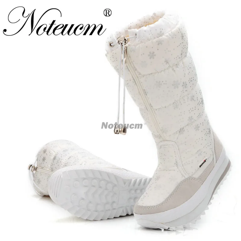 tall white snow boots