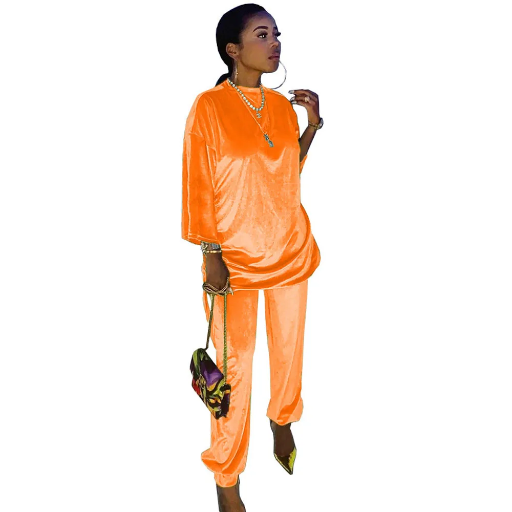 orange velvet tracksuit