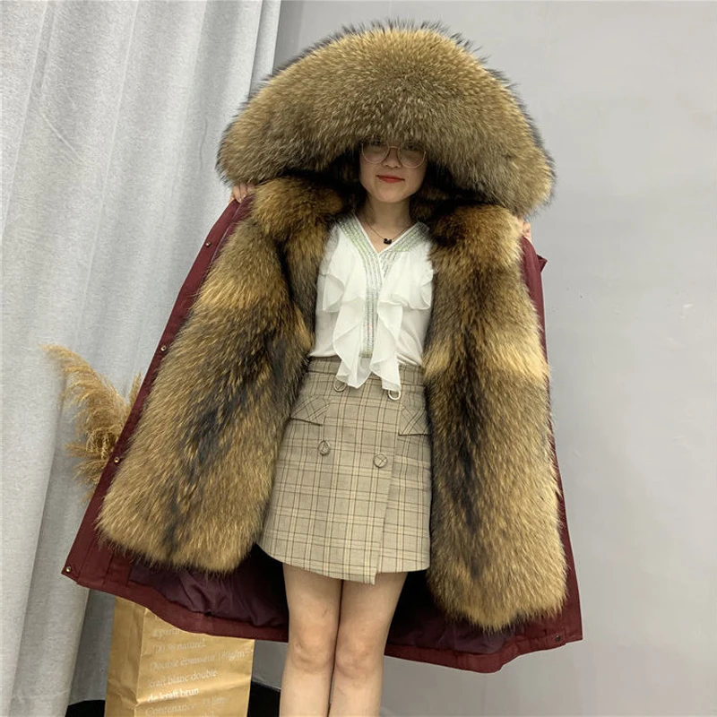 

2020 new style to overcome the female long section of the Parker Wang whole skin raccoon hair door placket mink liner warm coat