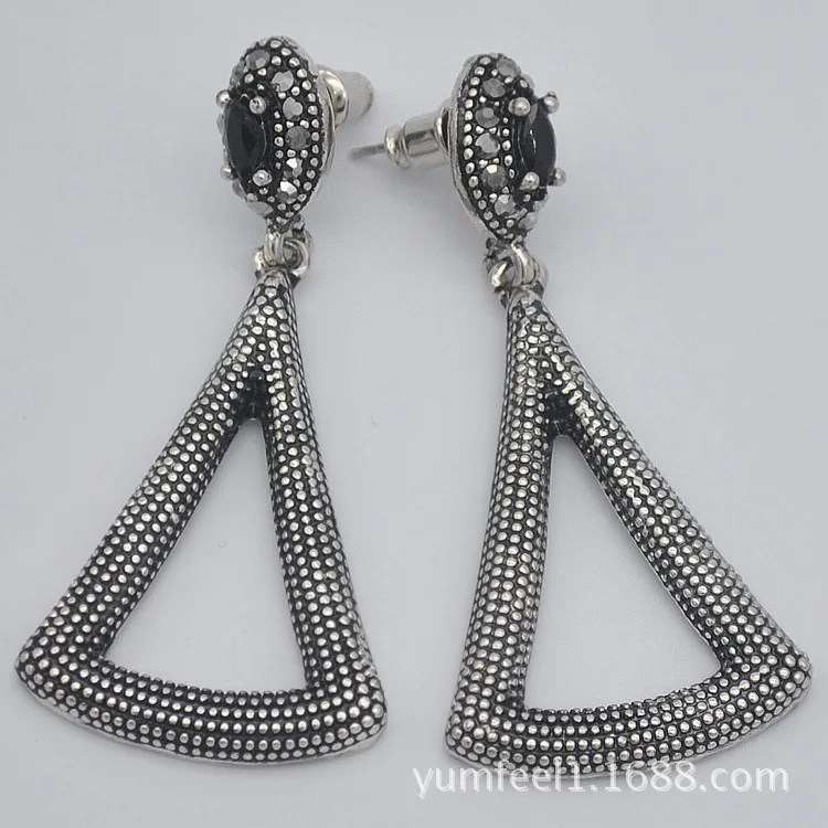 

ancient ways OL geometry three wildebeest eye stone temperament earrings T stage E1717 runway looks exaggerated earring