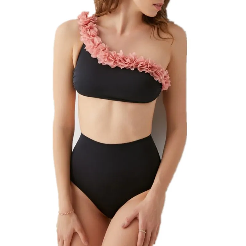 black swimsuit with pink flowers