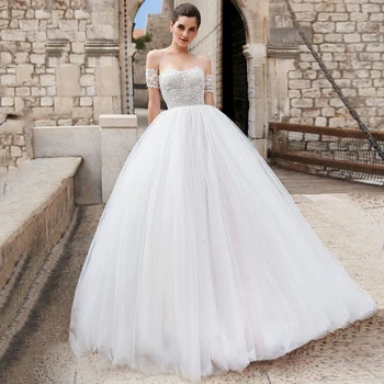 

Sexy Strapless A-line Wedding Gowns 2020 Off-the-shoulder Lace Appliques Sweep Train Tulle Bridal Dresses