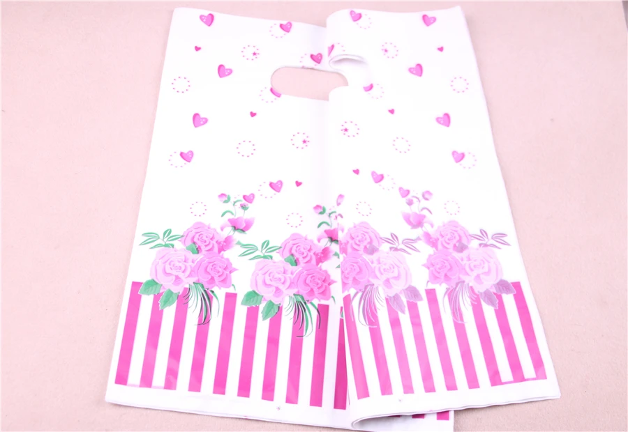 birthday gift bags New Plastic Shopping Bags With Pink Lovely Rose Heart Flower Wholesale 100pcs/lot 25*35cm Sachet Cadeau bubble wrap roll