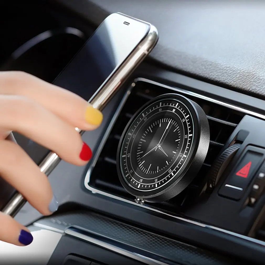 

Creative Car Air Outlet Instrument Panel Universal Clock Strong Magnet Suction Car Navigation Mobile Phone Bracket Supplies
