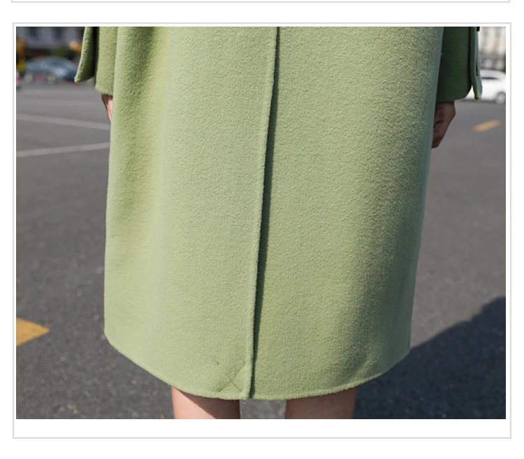 Woolen coat female long section winter new Korean version of the loose popular temperament trumpet buckle woolen