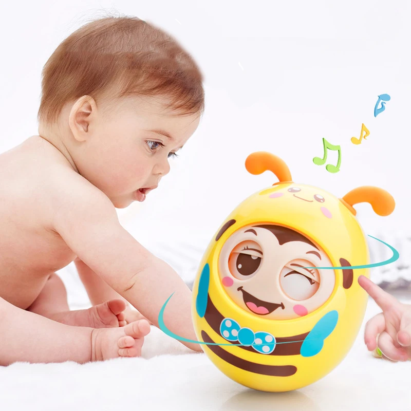 

Infant toys Round Blink Tumbler Safe ABS Materials Early Education Montessori Toys for Baby Music Rattle Toys for children