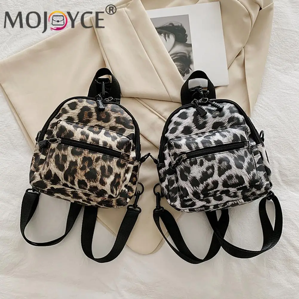 Mini mochila informal con estampado de leopardo para mujer, bolso de hombro tipo bandolera de cuero PU A la moda, bolsa de viaje portátil con cremallera