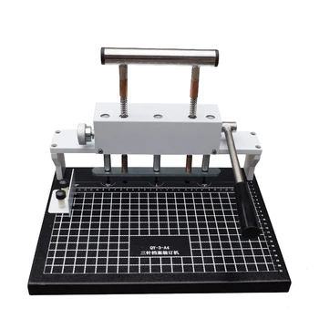 

Grid accurate positioning of archives document binding machine three-hole punching machine small manual punching machine