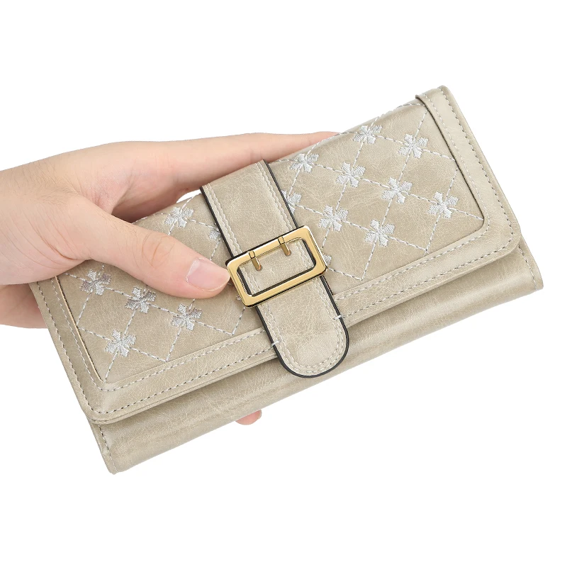 Hot sale Women's wallet versatile simple long clutch bag four-leaf clasp embossed mobile phone bag