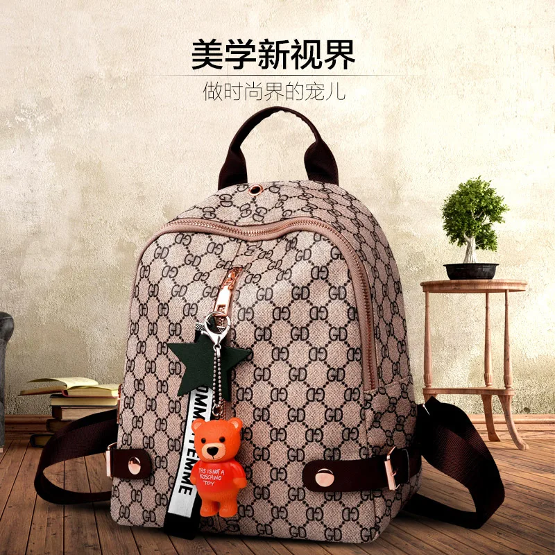 

2018 New Arrival Women's Backpack Comfortable Fabric Pay Tribute to Classic Multi-Storage Space Bear Pendant