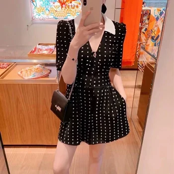

2020 Spring and Summer New Retro High-waisted Flocked Polka Dot V-neck Waist Hugging One-piece dress