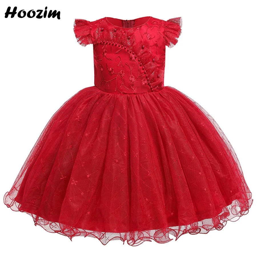 white dress with red embroidery