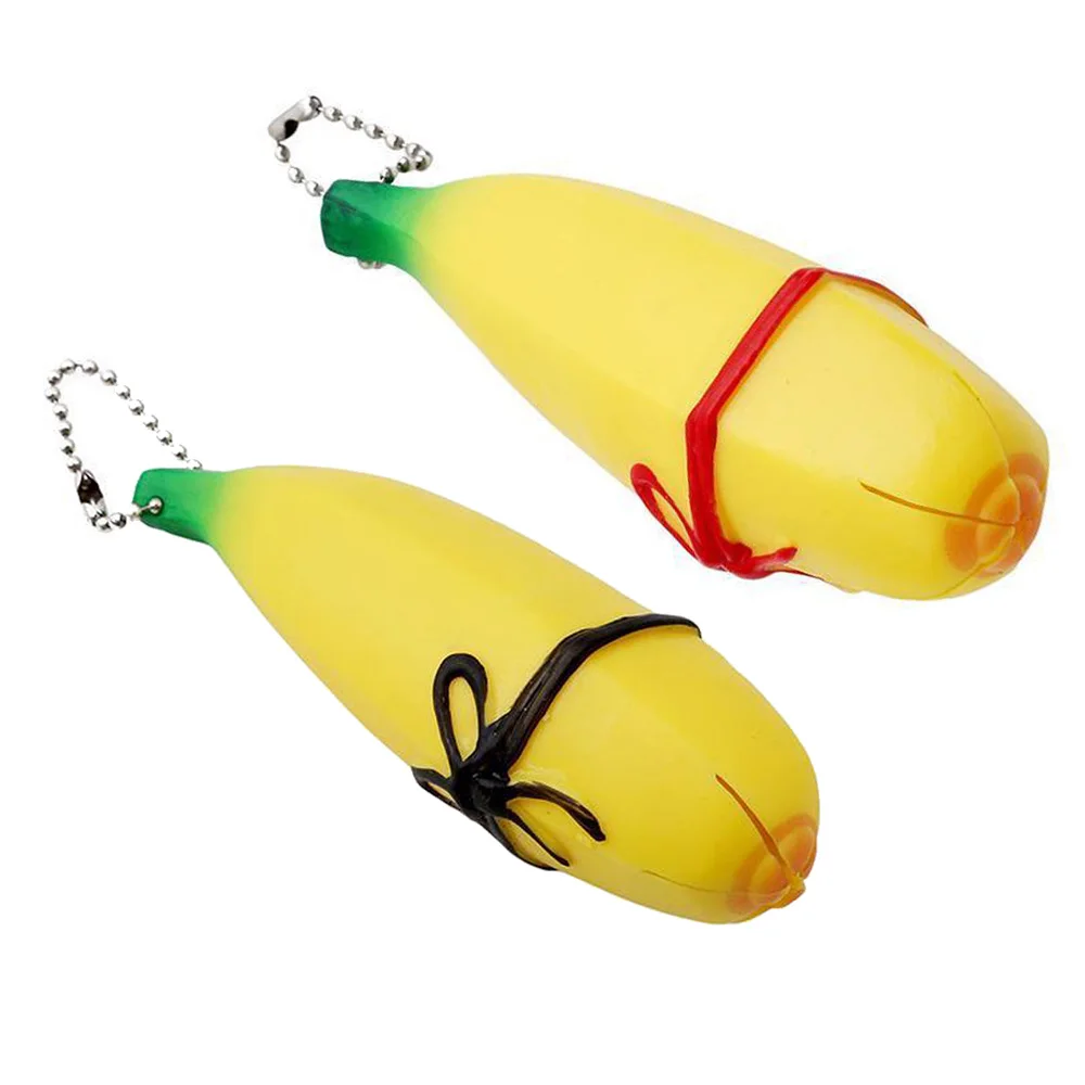 PLASTIC STRESS RELIEF BANANA SQUEEZE STRETCH BALL TENSION AUTISM HAND ANXIETY 1X