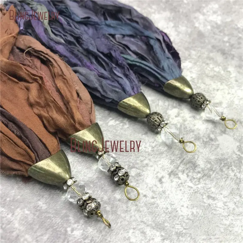 

Sari Silk Tassel Pendant Antique Bronze Cap Crystal Ball Accent Tassel Pendant PM28164