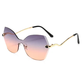 

Retro Woman Punk Frameless Integrated Conjoined Sun Glasses Personalized Trend Men's And Women's Fashion Integrated Goggles