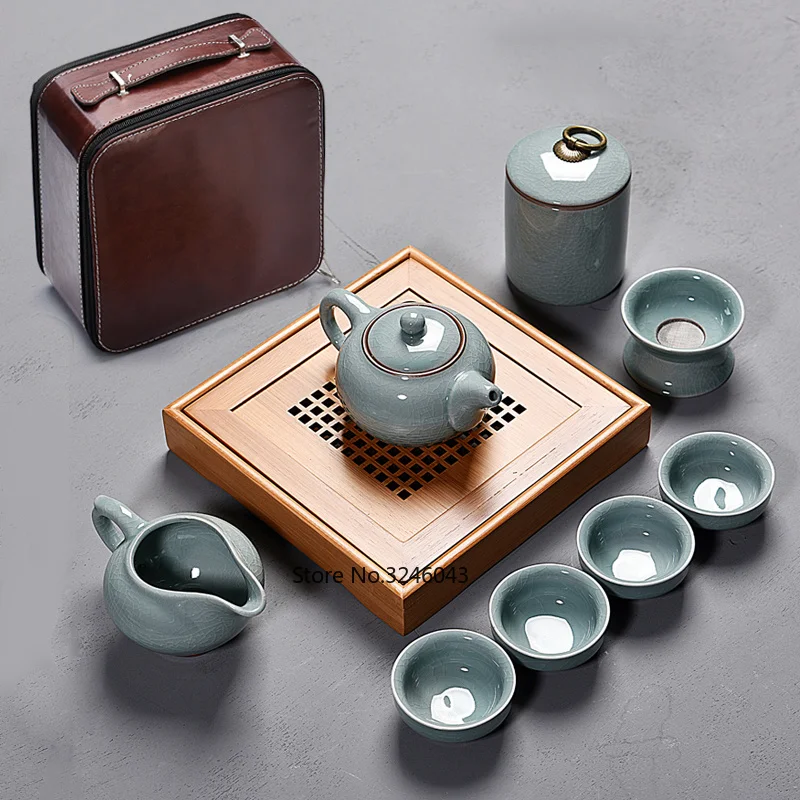 

Travel tea set 9 piece suit carrying case Household simple small Japanese ceramic teacup ruyao Kungfu tea set dry tea tray