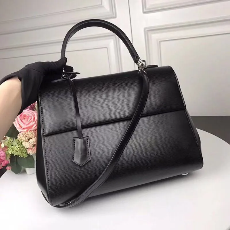 

2019 top custom brand-name luxury fashion in Europe and the bag head layer cowhide single shoulder hand ladies handbags