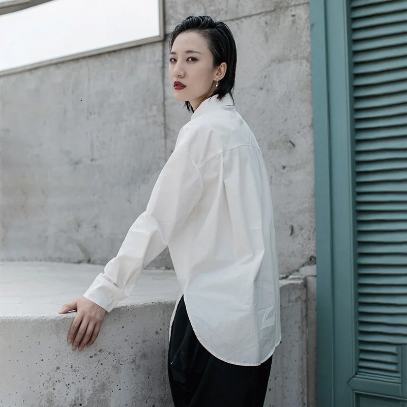 camisa blanca holgada