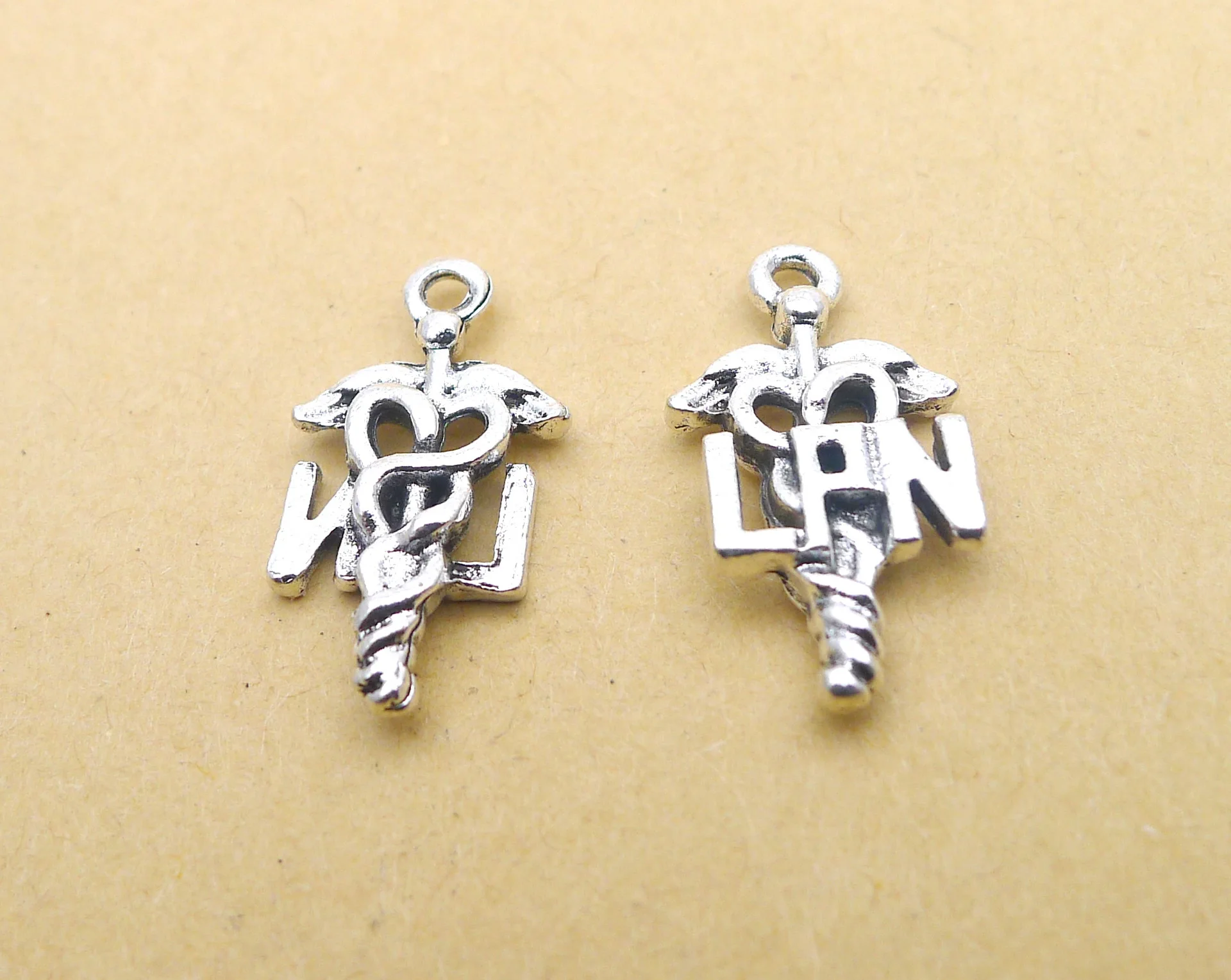 

Charm for making jewelry 10pcs 13x23mm antique silver color LPN Winged Snake charms