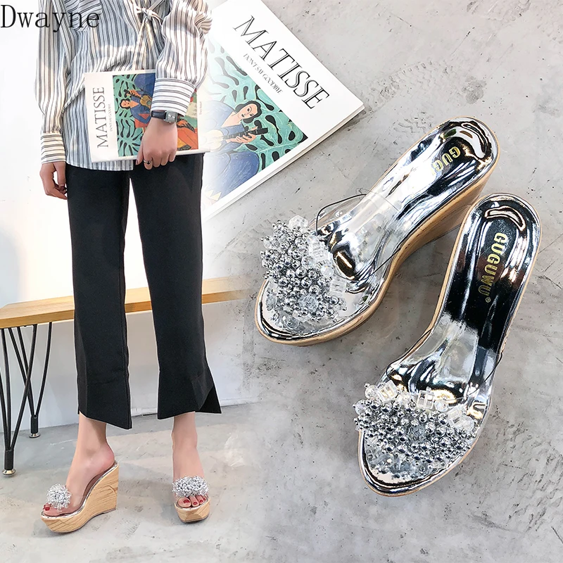 

Summer New Beach Sandals Slippers High-heeled Sandals and slippers Muffins Thick bottom Rhinestones Sandals and slippers.