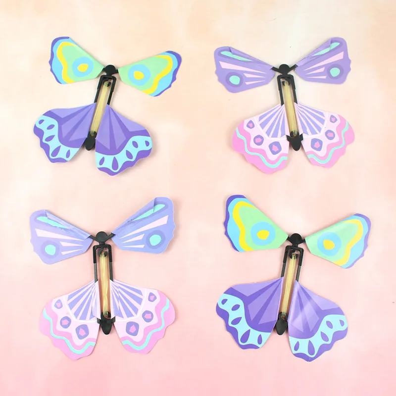 12 Pezzi Wind Up Elastico Fata Magica Flying Butterfly Card Sorpresa Fly Paper Farfalle Party Playing Toy Compleanno Natale