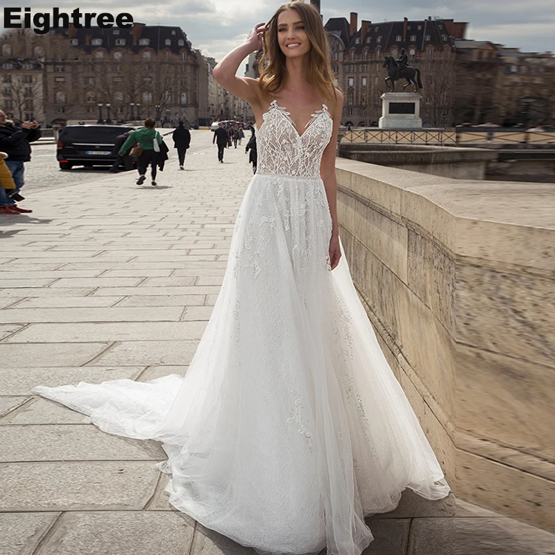 

Eightree V-Neck A Line Wedding Dresses Appliques Beading Spaghetti Straps Bride Dress Backless Plus Size Wedding Gown