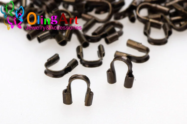 Olingart 100 Stück 6,5/4,5 mm Messingdrahtschutz, Drahtschutz, Schutzschlaufen, U-förmige Verschlüsse, Verbinder für die Schmuckherstellung – Detail 4