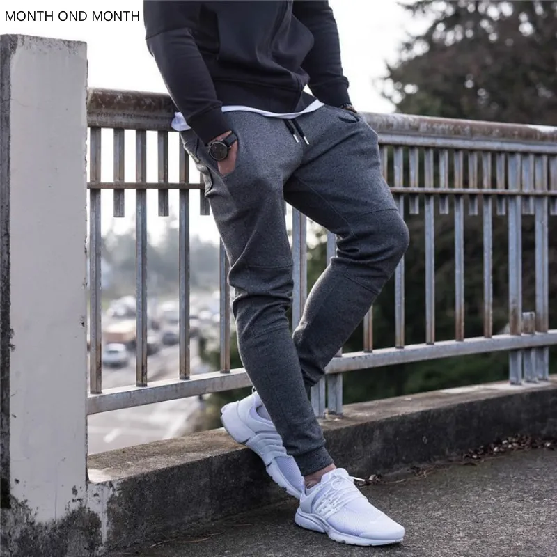 

Mens Sweatpants Autumn Winter Run Sports Joggers Pants Gyms Fitness Bodybuilding Workout Trousers Casual Cotton Pencil Pants New