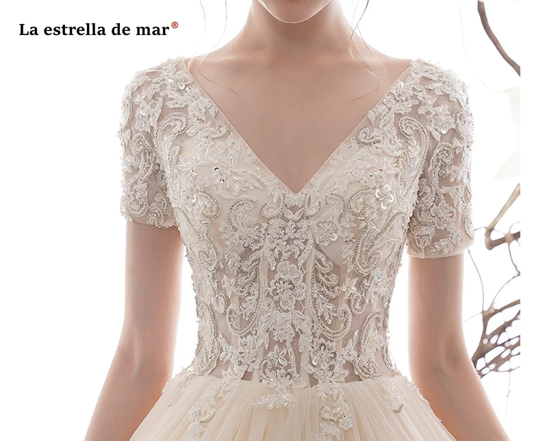 Vestido de noiva new sexy V neck short sleeve crystal Crystal luxury champagne wedding dress Ball Gown Dubai bride dress Royal T