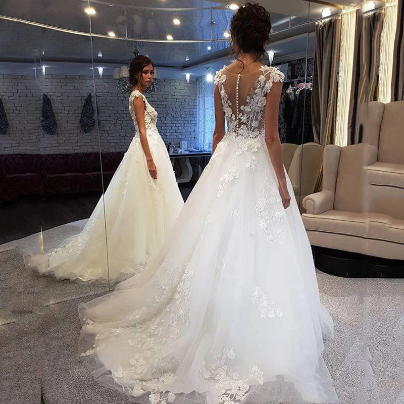 

Fashion Cap Sleeve Illusion neckline Wedding Dress with Appliques A-Line Back See Though With Buttons Tulle Bridal Dress