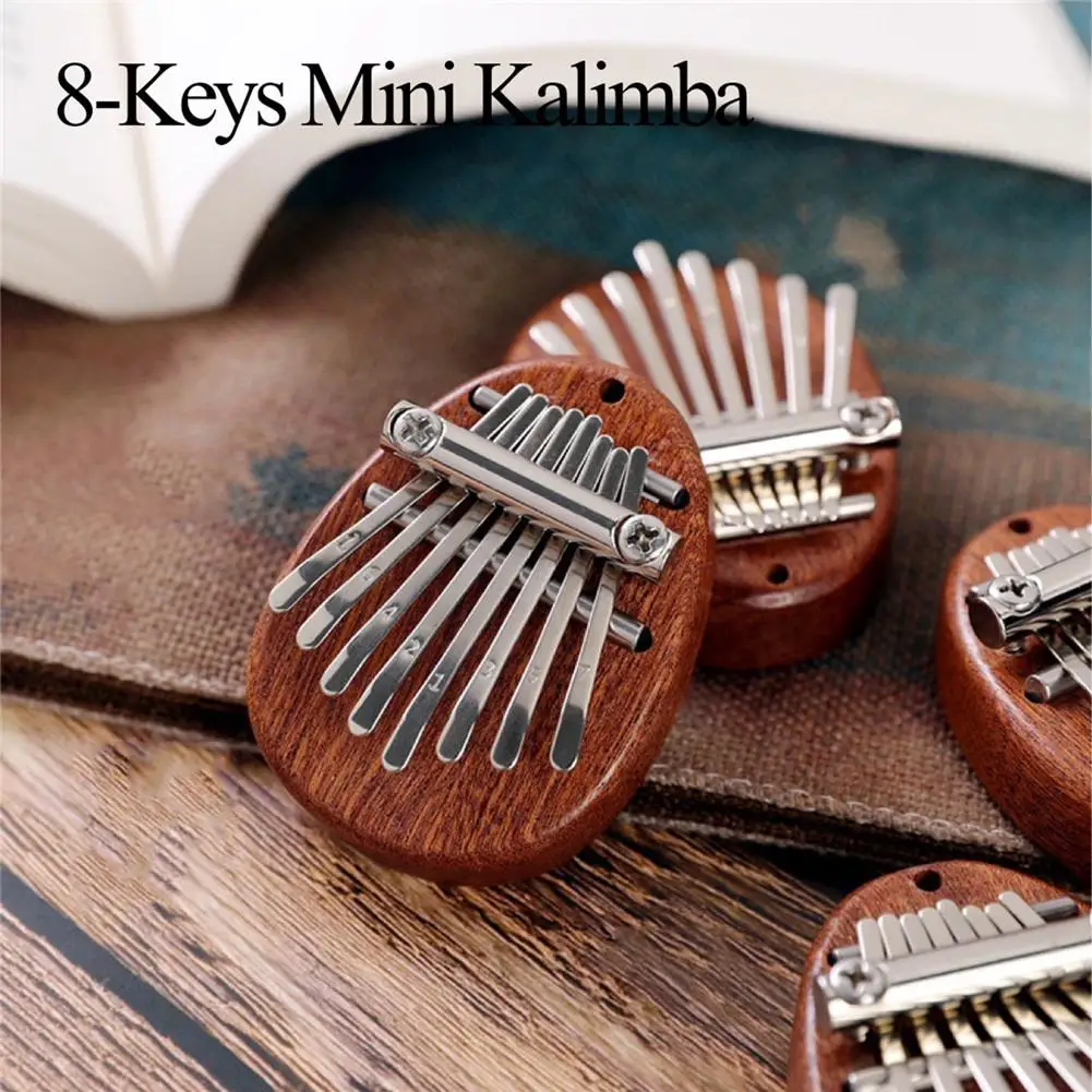 8 клавиш Овальный Kalimba портативный мини ремешок персиковый сердечник твердая