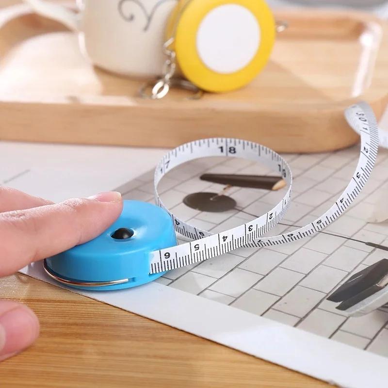 Description Picture 6 of item1PCS 150cm/60" Tape Measures Portable Retractable Ruler Mini Candy Color keychain Children Ruler Centimeter Inch Roll Tape