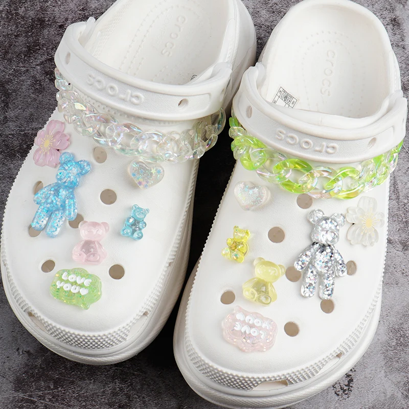 white crocs with accessories