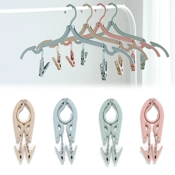 

1 pcs Travel Portable Clothes Hanger Space Save Folding Plastic Clothes Rack Pants Socks Hook Multi-function Wardrobe Organizer