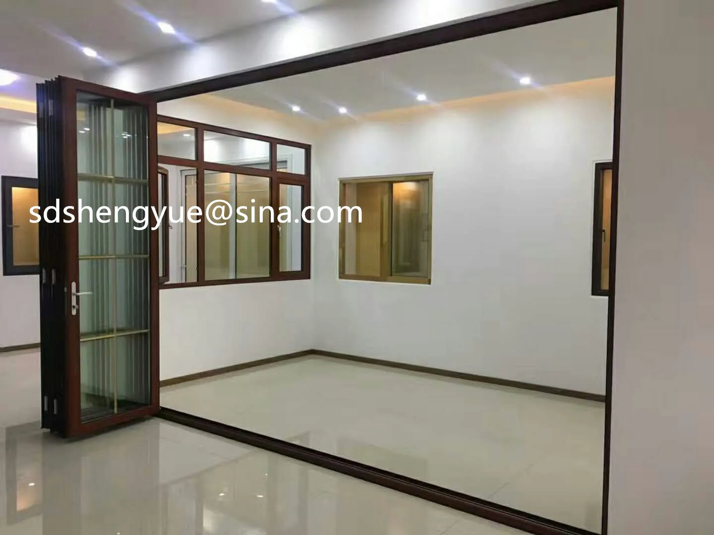 aluminumtemperedglassfoldingbifolddoorspricebangladesh.jpg