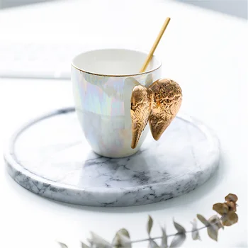 

Creative White Ceramic Coffee Mug Gold Plated Handle Angel Wings Office Home Tea Milk Porcelain Mugs Couple Gift Home Decoration