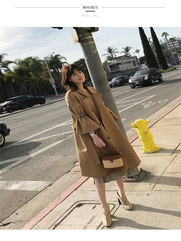 

Windbreaker Spring New Female Horn Sleeve Long Section of Knee Loose Lace Double-Breasted Coat Tide.