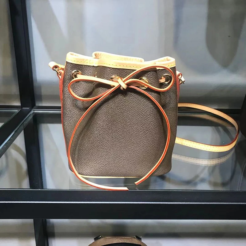 

Women's bag 20 new style old flower super hot fashionable all-around straddle one shoulder drawstring Mini bucket bag for women