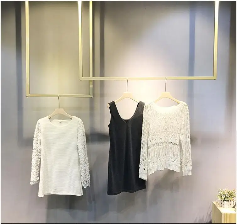 

Clothing store display rack hanger gold ceiling hanging women's clothing store display rack wall clothing rack