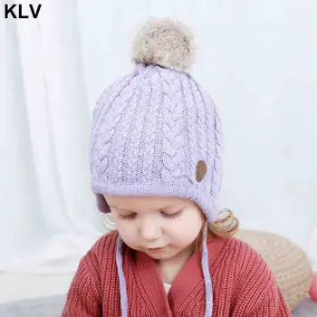 

Baby Hat Girls Warm Winter Lace Up Beanie Cap Ball Ear Protection Toddler Hat for 1-4 Years Old