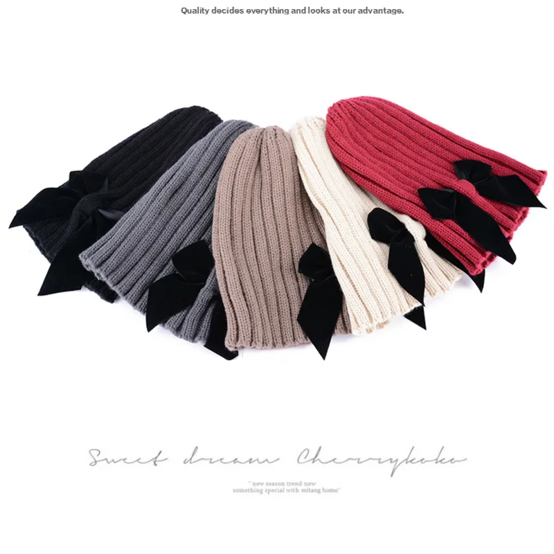 

Autumn and winter hat female cute bow wool hat knit hat baotou hat wild warm solid color fashion winter tide hat female winter