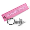 Изображение товара https://ae01.alicdn.com/kf/Hd4d666719a104759b07a186b70f14714d/Pink-Kiss-Me-Before-Flight-Key-Chain-Label-Embroidery-Keychain-with-Metal-Plane-Key-Chain-for.jpg
