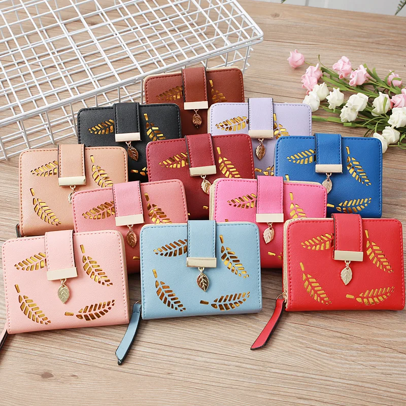 

New Korean Ladies Trumpet Hollow Leaves Flower Hand Bag Short Ladies Card Bag