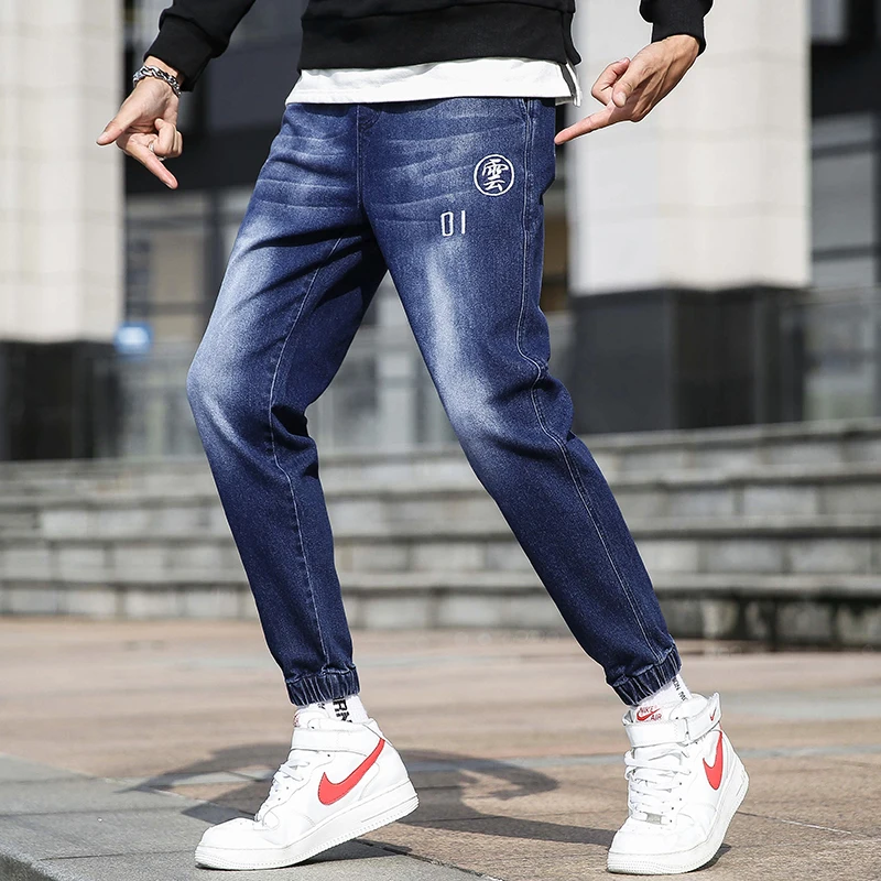 

Spring jeans men loose harlan foot han edition men's casual pants tide elastic beam light color pants popular logo The thin pant