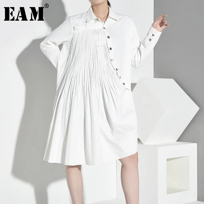 [EAM] Женская плиссированная Асимметричная блузка на косой пуговице с отворотом и длинным рукавом, свободная рубашка с разрезом, модная весенняя Осенняя JZ5300