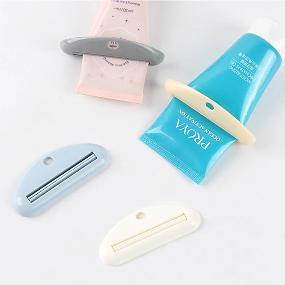 

2pcs Bathroom Home Tube Rolling Holder Squeezer Cartoon Toothpaste Dispenser Creative Hot