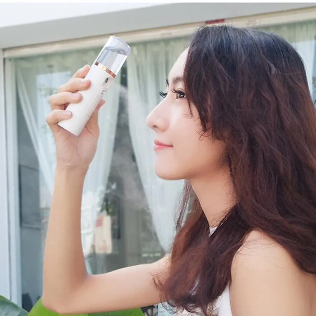 Mini Female Portable Beauty Apparatus Nano Humidifier Charging Mini Steamed Face Humidifier Portable Size 5