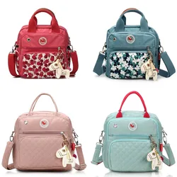 Bolsa de pañales colorida de lona de alto nivel para mamá, bolsas de pañales para bebé, mochila de maternidad, bolso de mano, bolsa de mensajero tres en uno
