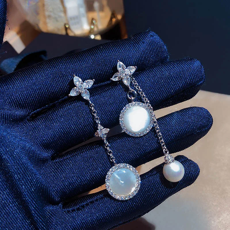 

The new hot S925 pure silver Stars Natural shellfish Eardrop fashion jewelryu popular female Sweet Lovely the Pearl earring