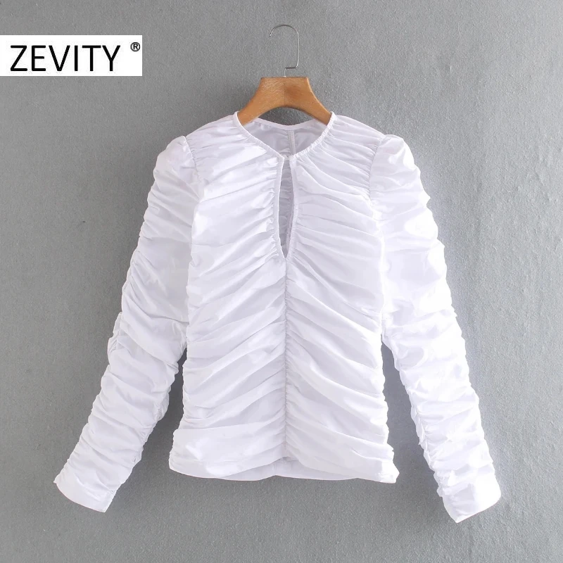 ZEVITY women vintage front hole pleated white smock blouse office ladies o neck puff sleeve zipper shirt chic blusas tops LS7106 ZEVITY women vintage front hole pleated white smock blouse office ladies o neck puff sleeve zipper shirt chic blusas tops LS7106
